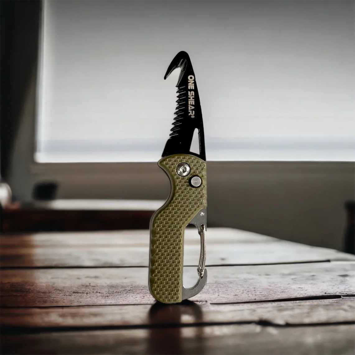 Olive Drab Seat Belt Keychain Knife Evacuation Tool with carabiner and serrated edge spring action